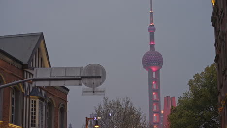 oriental pearl tv tower during covid 19 lockdown of 2022 in shanghai, china at dusk