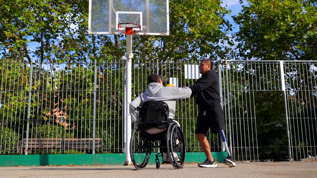 People with disabilities playing basketball