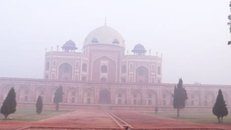 humayun tomb at misty morning from unique perspective shot is taken at delhi india