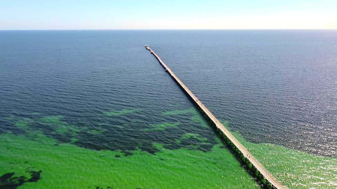 High aerial view with Busselton Jetty stretching toward the horizon - Western Australia