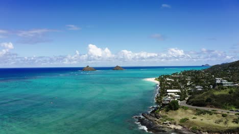 aerial view of kailua, hawaii's teal shoreline on a sunny day