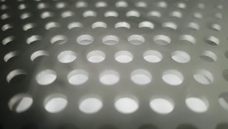 aluminium sheet grill with punched holes creating interesting pattern