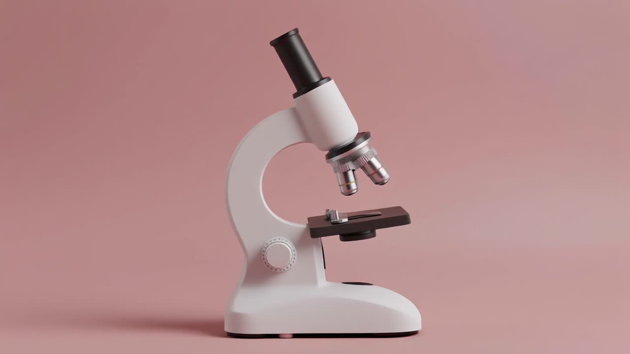 Modern Microscope Adjusting Lenses and Stage on Pink Background