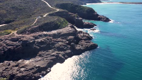 drone aerial footage of lake munmorah state conservation area snapper point central coast coastline pacific ocean tourism nsw australia 3840x2160 4k