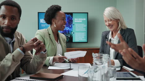 diverse business team collaborating in an office meeting
