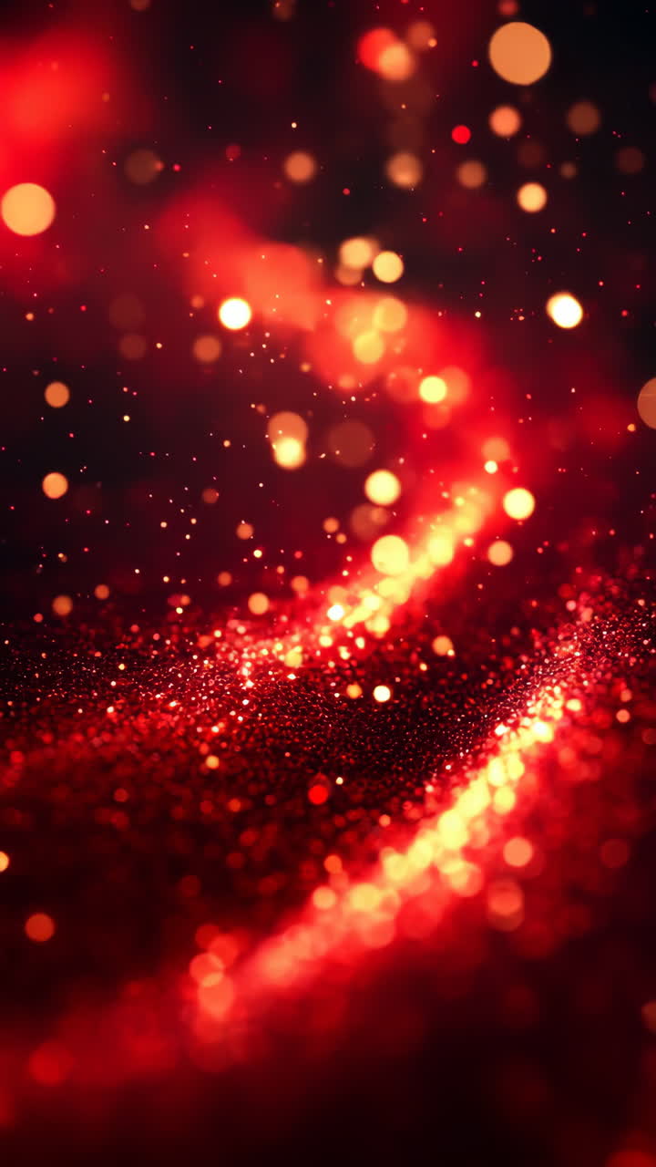 Motioning red sparkles. Vibrant red sparkles and glowing particles create a dynamic and captivating display against a dark background.