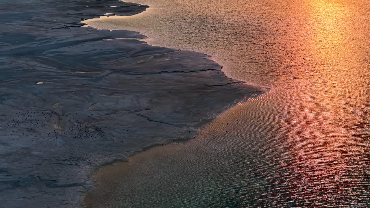 Aerial view of Quarry sand and lake at goldenhour