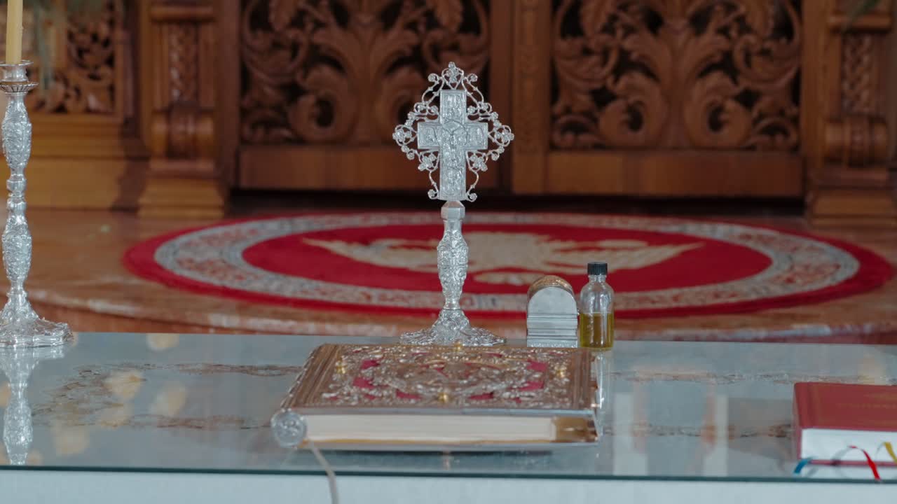 Euchologion next to holy oil. Sacred Orthodox Liturgical Book Centerpiece for Baptismal Ceremony in Sts Constantine and Helen Cathedral from Chicago Illinois, USA
