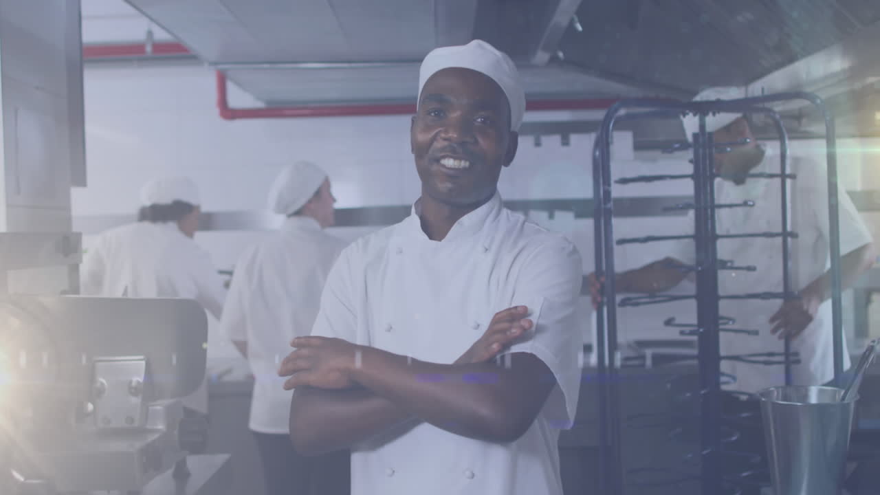 Animazione di chef afroamericano che sorride in cucina su punti luce
