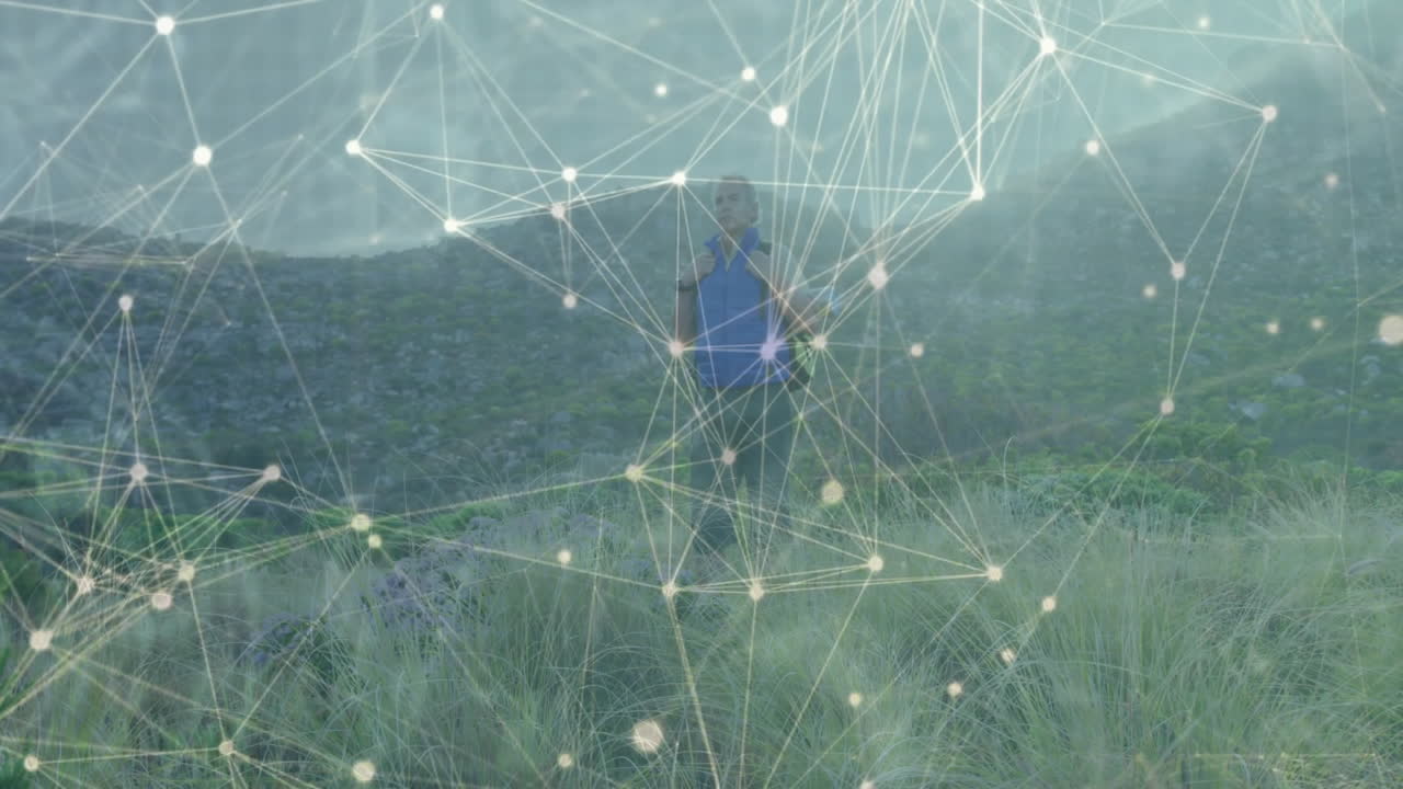 hiker standing on grassy hillside, interacting with digital network overlay in technology demo