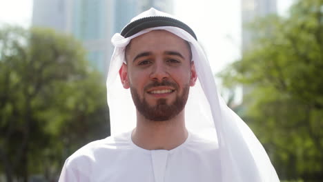 man with arabic clothing in the street