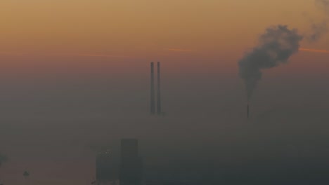 unbelievable fog conditions in dublin - sunrise in the poolbeg chimney's - 4k cinematic drone footage 04 - co.dublin - ireland
