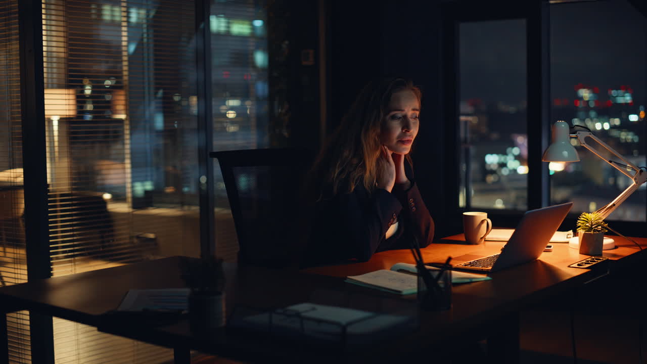 Upset manager reading notification in night office. Closeup woman closing laptop