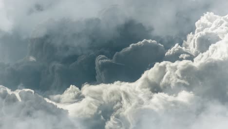 cumulus cloud, a thunderstorm between dark and light clouds