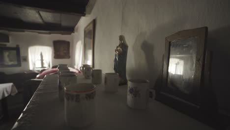 Maria-statue-in-old-hungarian-house-camera-moves-backward