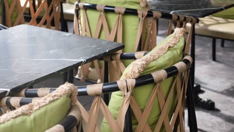 modern outdoor cafe with green cushions