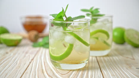 iced honey and lime soda with mint - refreshing drink