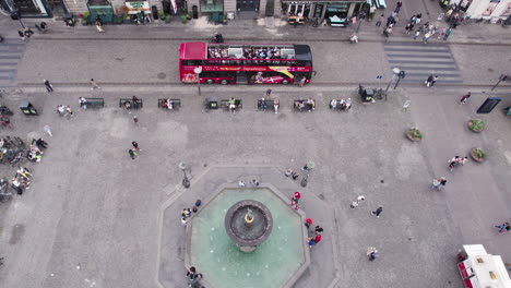 Experience-the-lively-atmosphere-of-Gammeltorv-Square-in-Copenhagen-during-rush-hour,-with-throngs-of-people-on-the-pedestrian-street