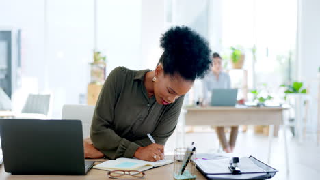 business woman, laptop and writing on paper