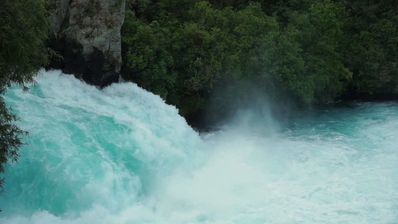 SLOWMO - Close up raging whitewater rapids Huka Falls in New Zealand