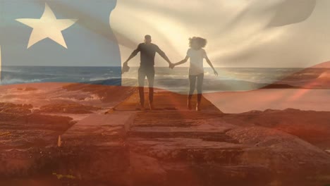 Animation-of-flag-of-chile-over-african-american-couple-at-beach