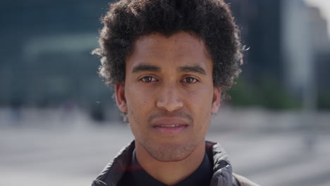 close-up-portrait-successful-young-mixed-race-business-man-looking-confident-expression-at-camera-in-city-ethnic-male-trendy-afro-hairstyle
