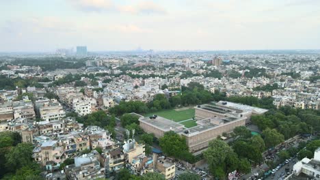 4K-Aerial-Shots-of-New-Delhi-Residential-Suburbs-on-a-beautiful-day-gliding-over-Rooftops,-streets,-parks-and-markets-in-India