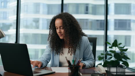 woman conducting online consultation using laptop close up. girl working office