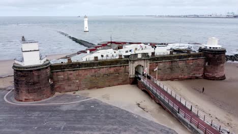 fort perch rock new brighton sandstone coastal defence battery museum aerial view left parallax lighthouse shot