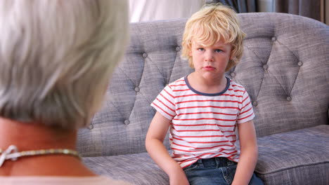 young boy having therapy with a child psychologist