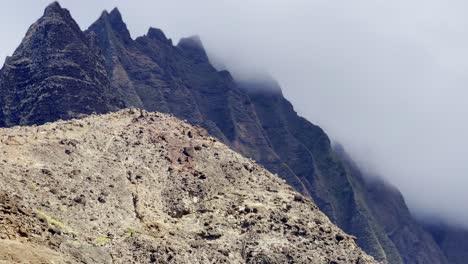 cinematic long lens shot from a boat of the iconic ridges of the na pali coast on the hawaiian island of kaua'i