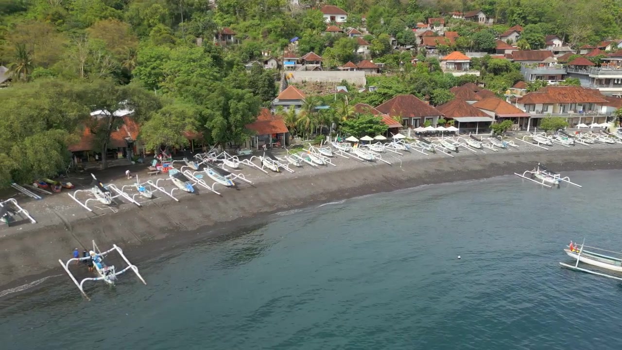 Stunning Holiday Location Jemeluk Bay Amed Bali Indonesia Drone Track Left Over Sand 4K 60FPS