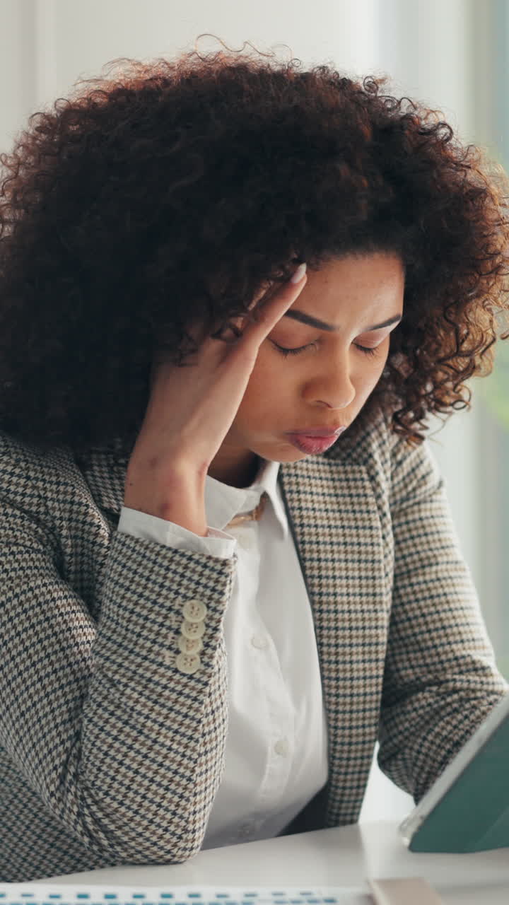 Stressed Businesswoman Reacting to Problem on Digital Tablet