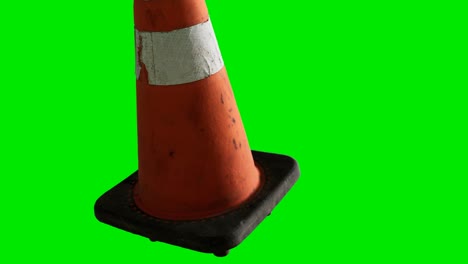 orange-traffic-cone-placed-at-green-chromakey-background