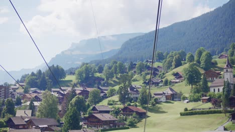 long shot, ski lift, switzerland, valley, aerial, rising, mountains, low to mid height