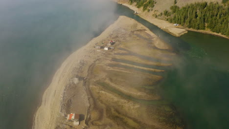 Scenic-aerial-view-of-foggy-Dark-Harbour-on-picturesque-Grand-Manan-Island,-New-Brunswick-Canada