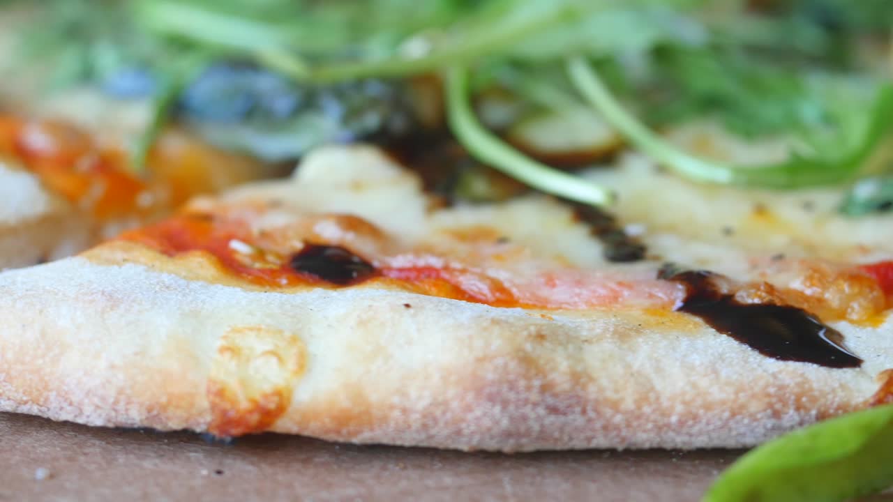 Closeup view of rotating delicious vegetarian pizza