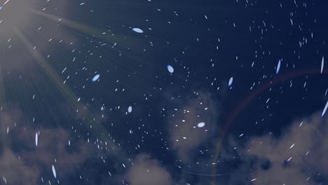 stars floating against fantasy cloudy background with sun flares animation