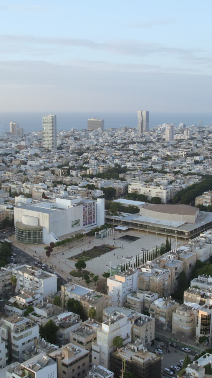 Theater building creates stunning parallax effect during sunset in Habima Square tel aviv, israel
