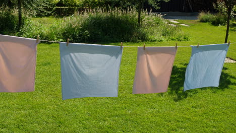 clothes drying on a clothesline in a garden