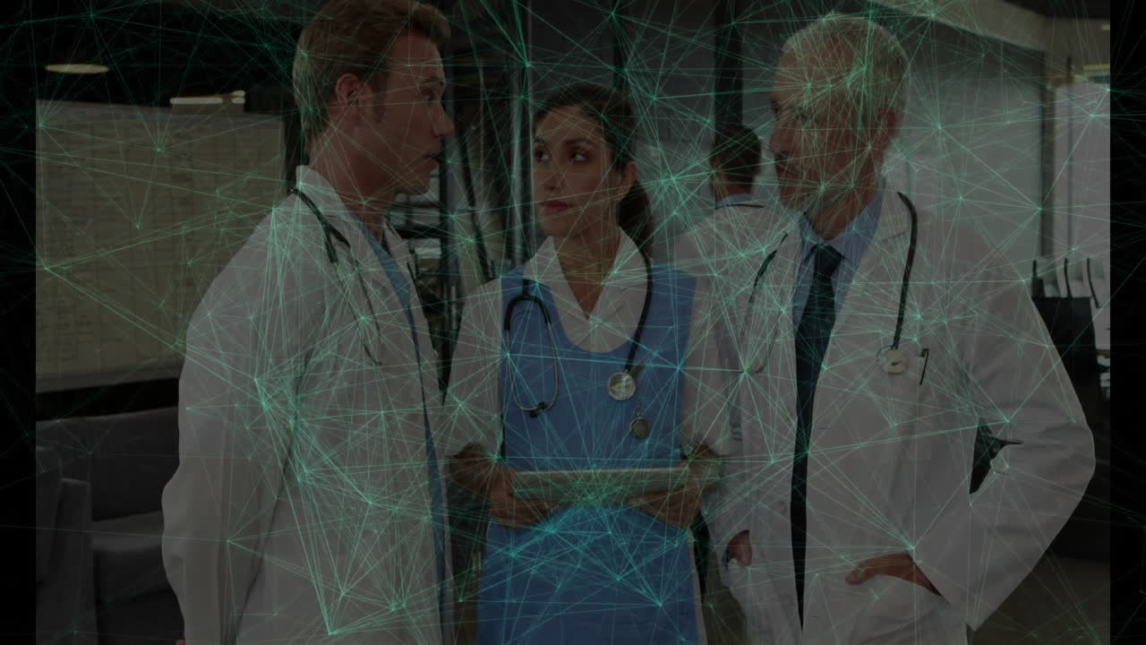 Medical team wearing stethoscopes reviewing tablet in hospital hub, displaying animated data links