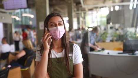 woman talking on phone in office setting
