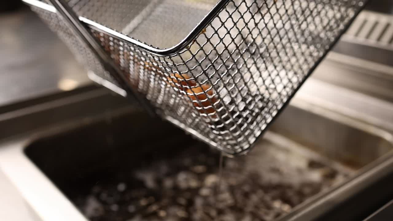 Food Being Fried in a Commercial Fryer