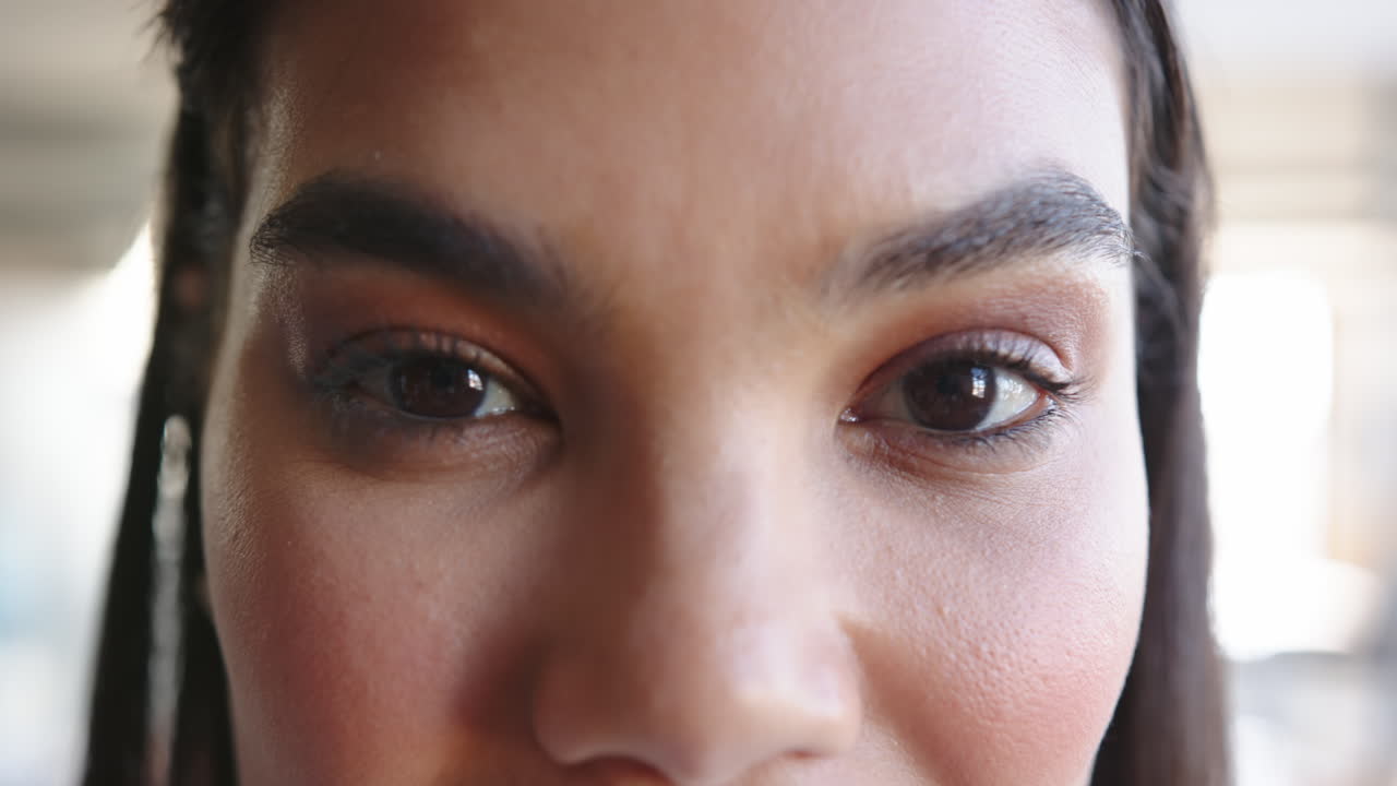 Close-up of woman eyes and eyebrows, focusing on natural beauty and expression