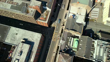 descending aerial filmed next to the seanad éireann in dublin city centre, county leinster. filmed in 4k, 60fps and with rec709 color.