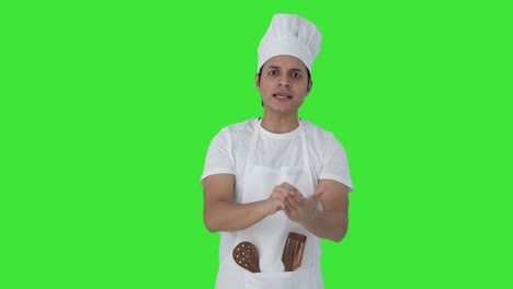 angry indian professional shouting on someone green screen