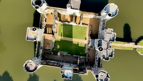 experience bodiam castle like never before with breathtaking aerial drone footage. a unique birds eye ascent. perfect for historical, travel, and cinematic projects.