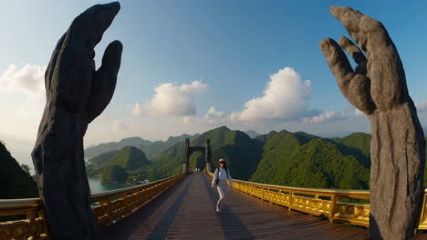 friends taking a selfie on the iconic golden bridge in vietnam