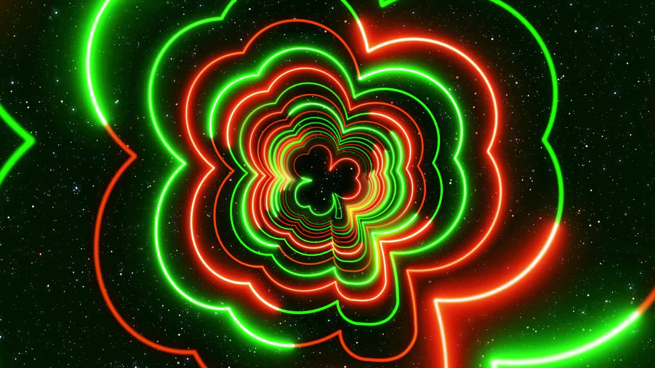 abstracto festivo brillante verde y naranja tres hojas de trébol líneas túnel de luz de neón girando con brillo brillo polvo de estrellas bucle sin costuras