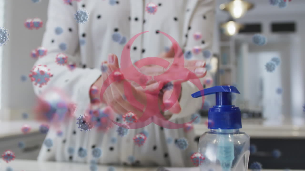 손을  ⁇ 는 사람 위의 코로나 19 세포의 애니메이션